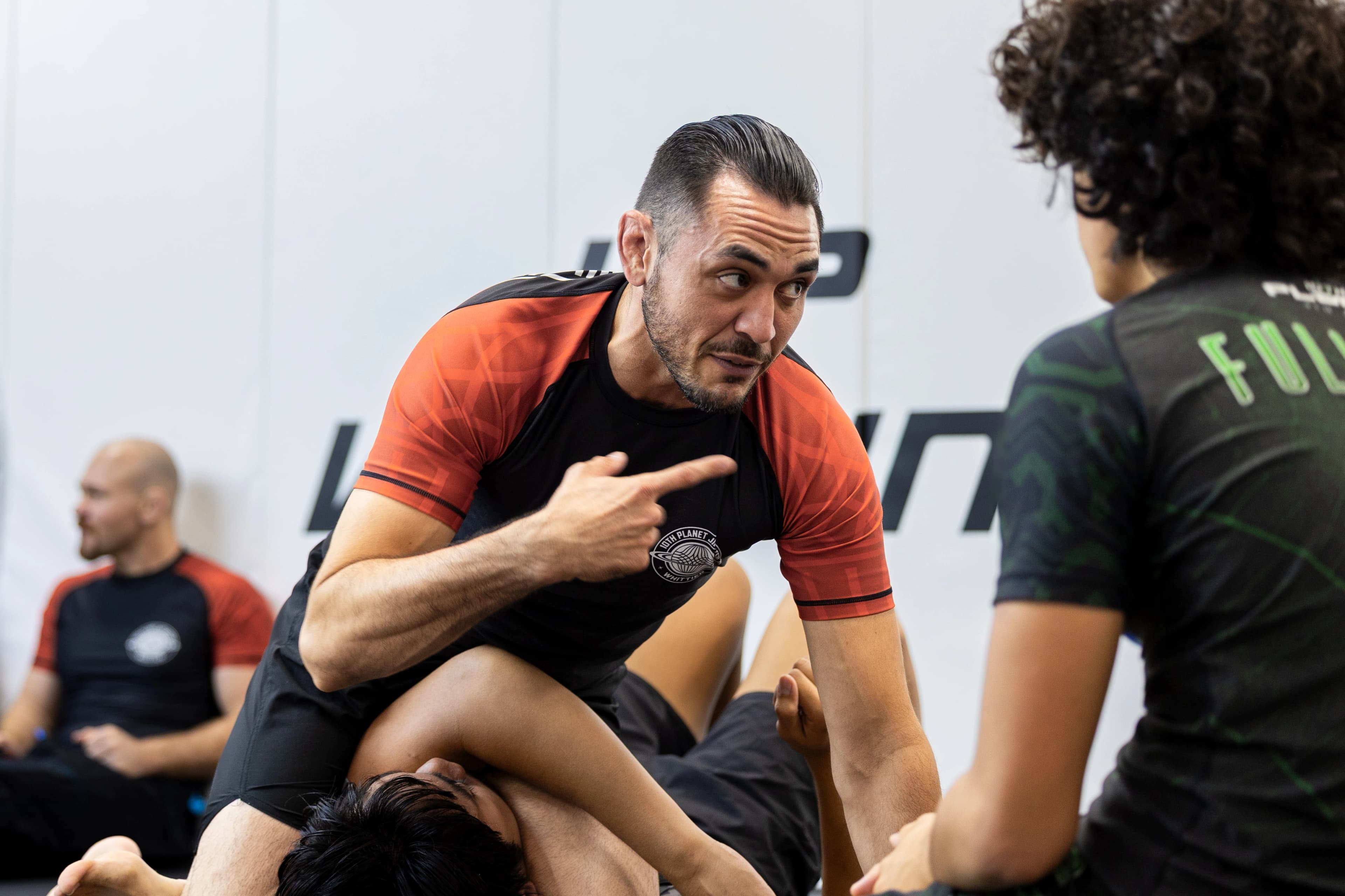 Coach Mike Wilson coaching live training.